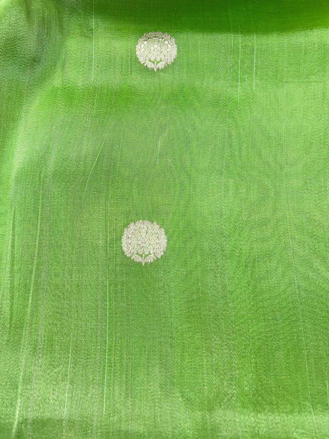 Lime Green tissue silk saree with Elegant zari woven circular butti closeup view 02