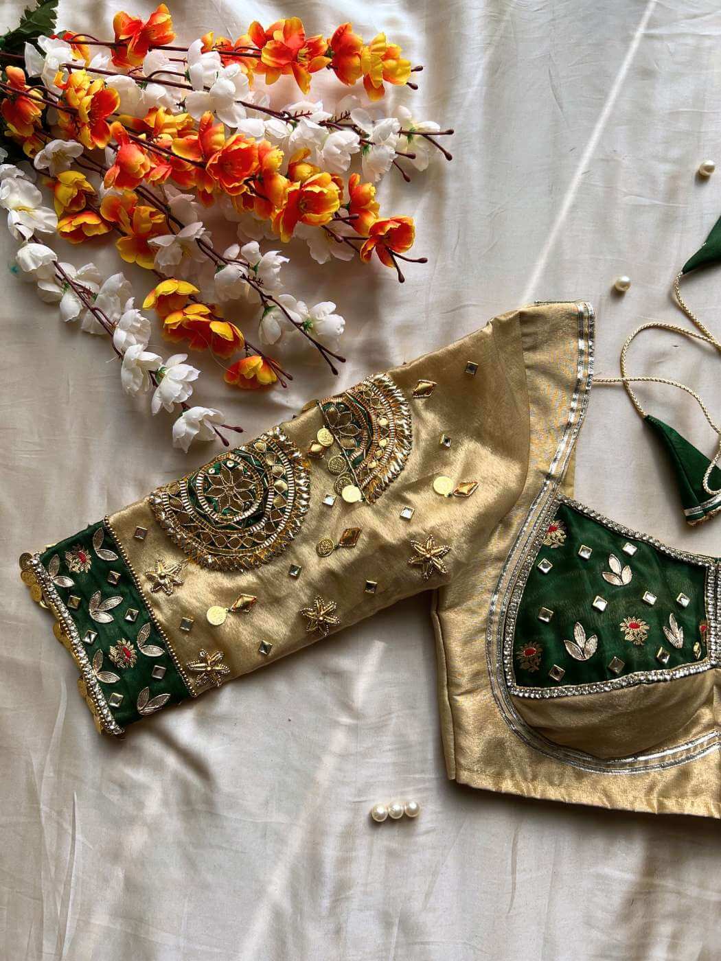 Green Banarasi silk blouse designed for traditional sarees