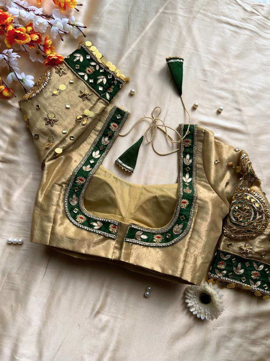 Green Banarasi silk blouse designed for traditional sarees