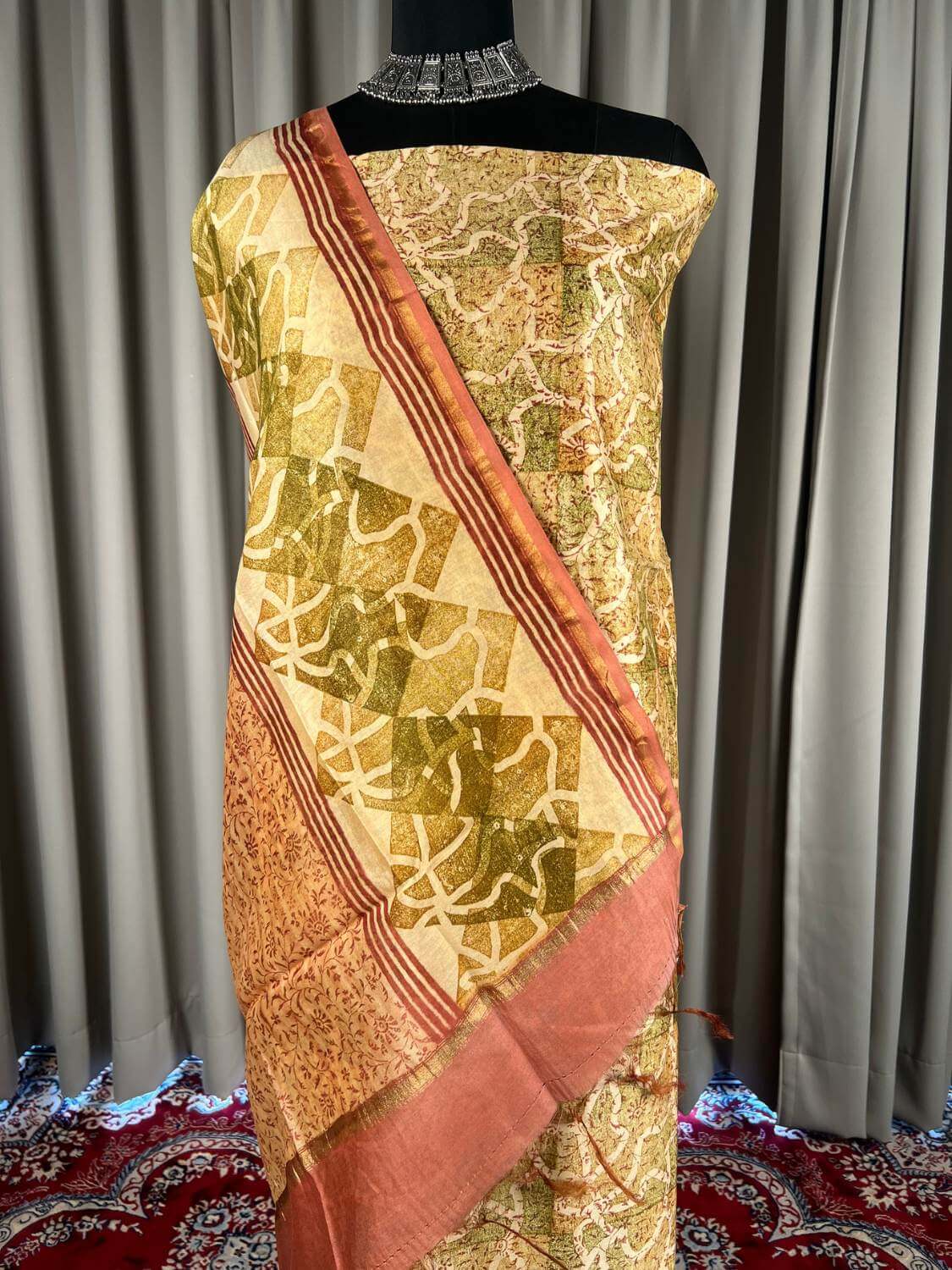 Maroon Mul Chanderi Suit with floral and abstract hand block closeup view