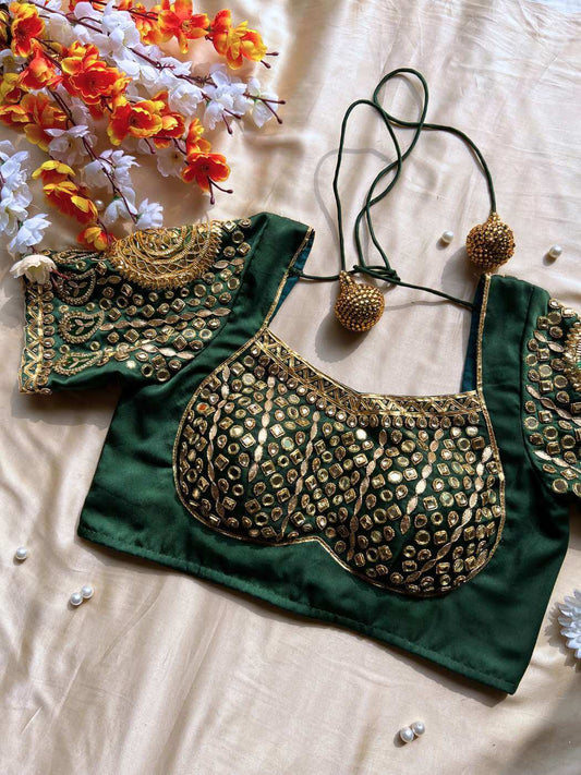 Green Banarasi silk blouse designed for traditional sarees