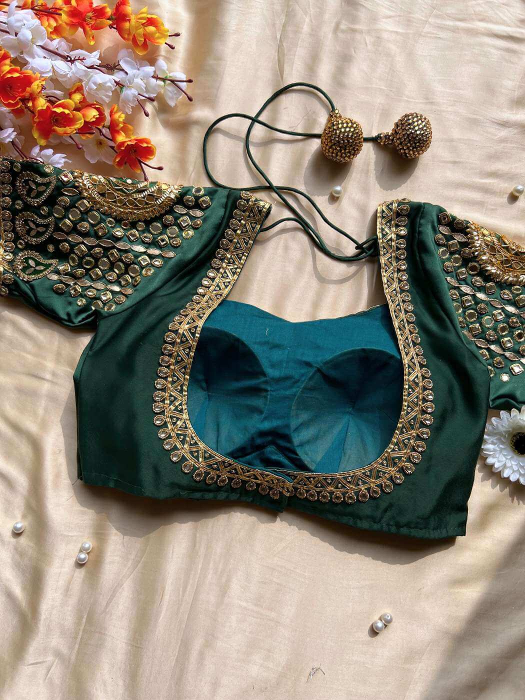 Green Banarasi silk blouse designed for traditional sarees