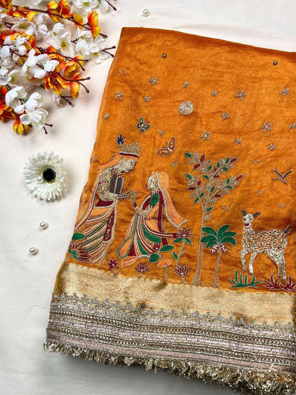 Orange Radha Krishna Banarasi silk saree featuring divine traditional artwork