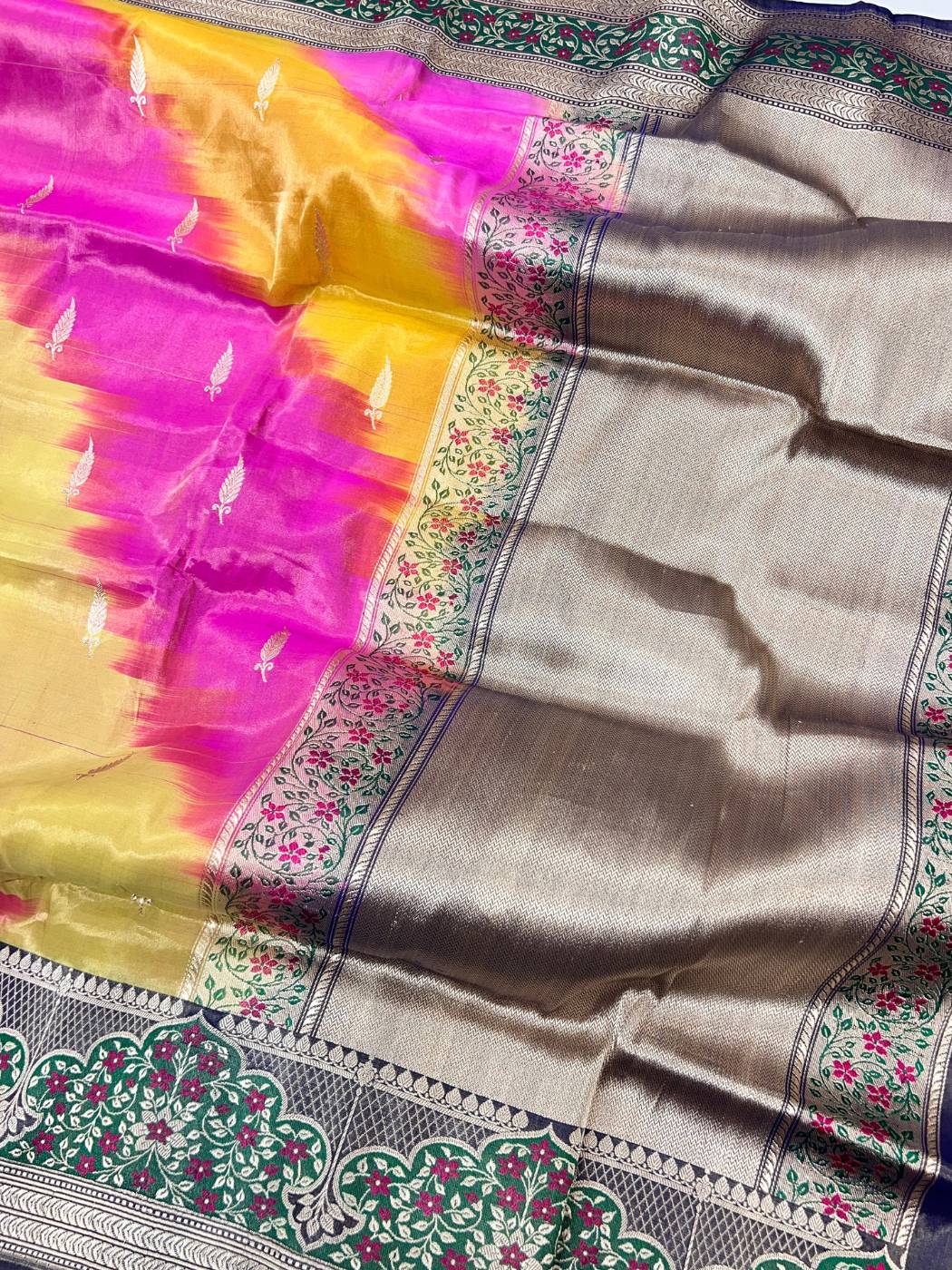 Multicolor tissue katan silk saree with Floral woven borders with zari butis closeup view 01