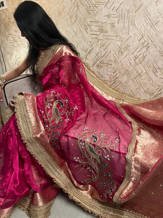 Designer Hot Pink Morni Saree crafted in rich Banarasi tissue silk with intricate hand embroidery and morni artwork - Mantavya banaras