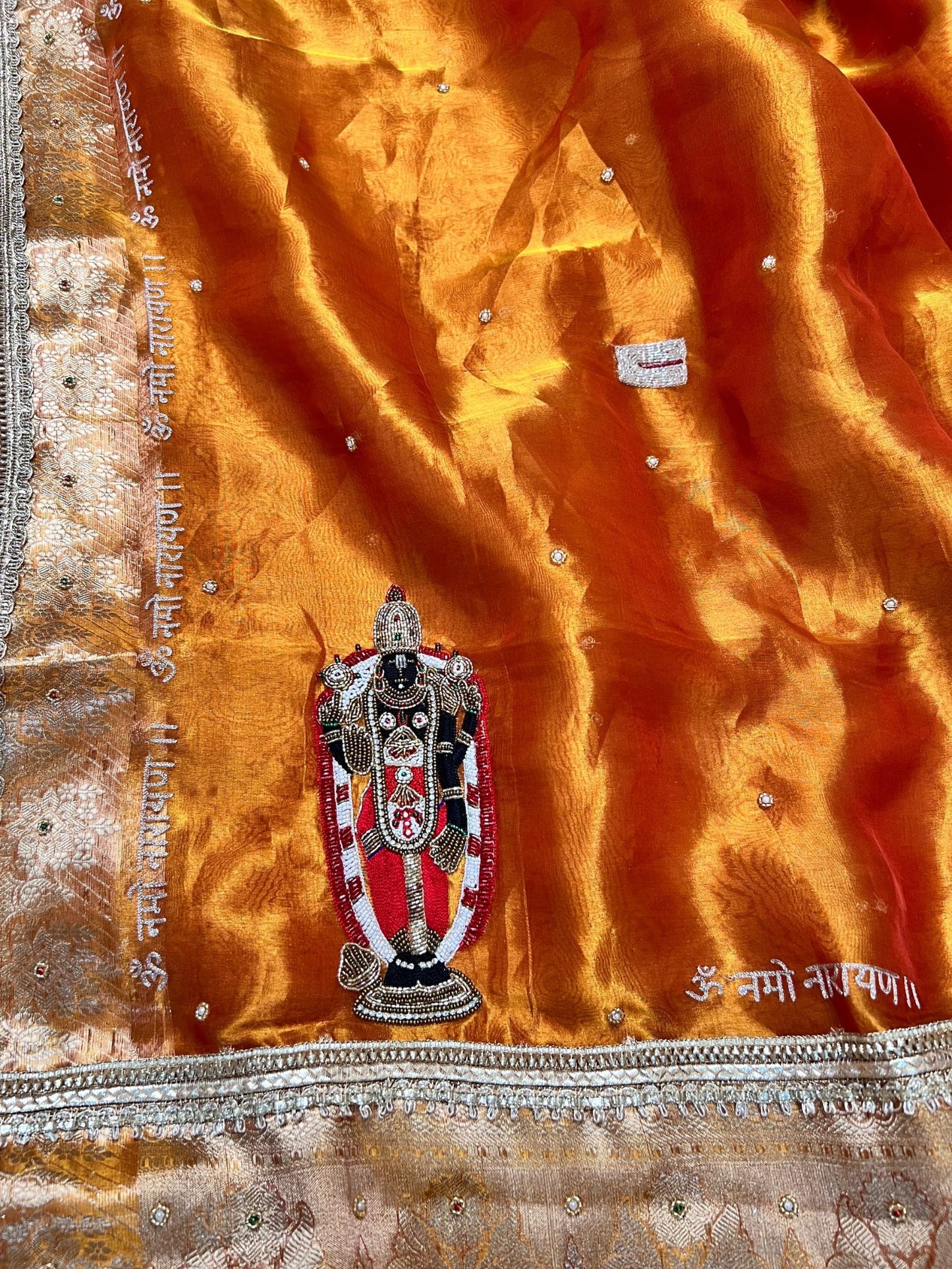 100% Pure Banarasi Tissue Silk Saree with Shri Bala Ji Tirupati Balaji Venkateshwar embroidery in golden-orange shade, traditional Banarasi Tissue Silk saree for festive and wedding wear