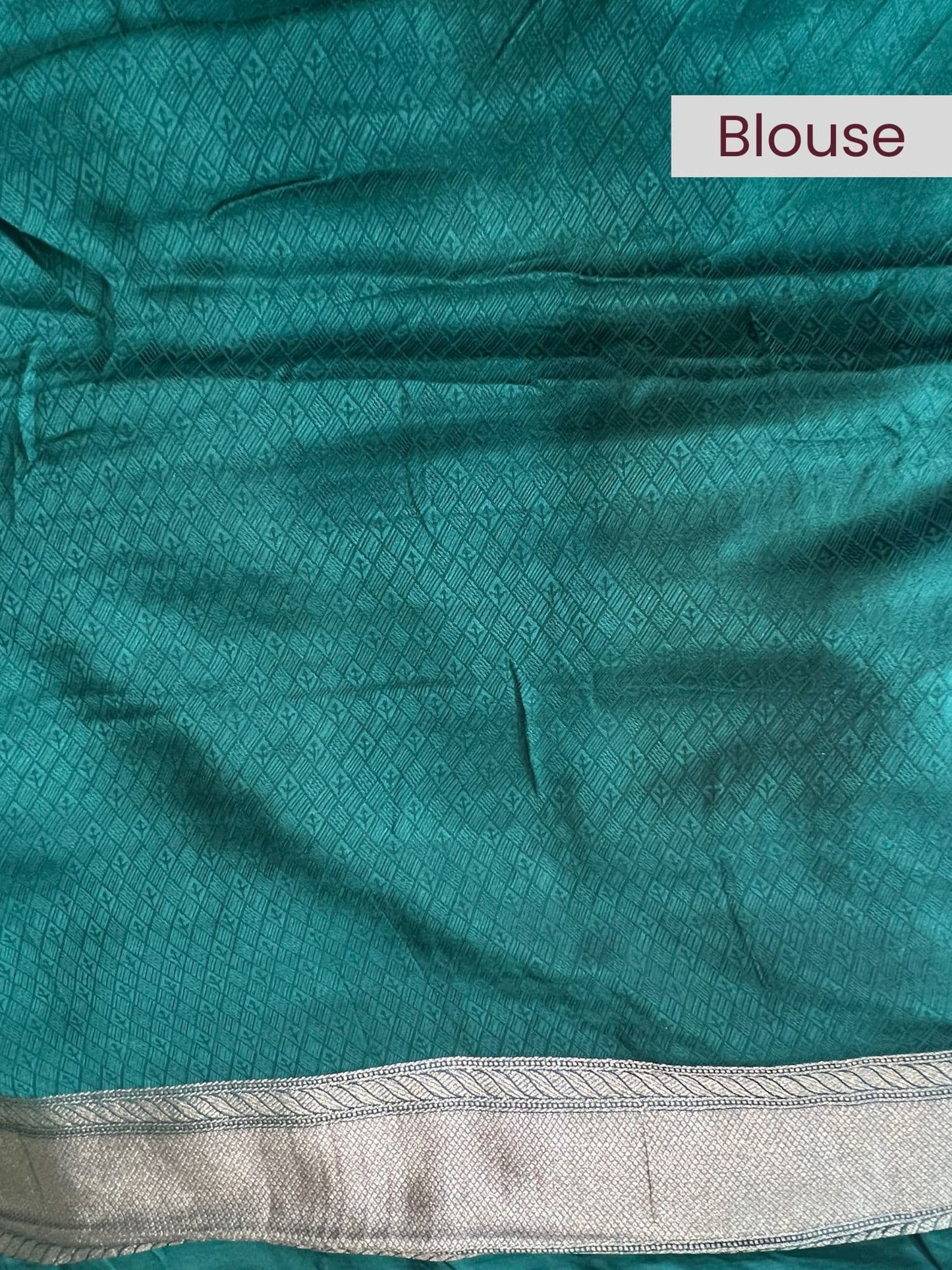 Elegant green Mashru silk blouse with rich texture and glossy traditional finish – Mantavya Banaras.