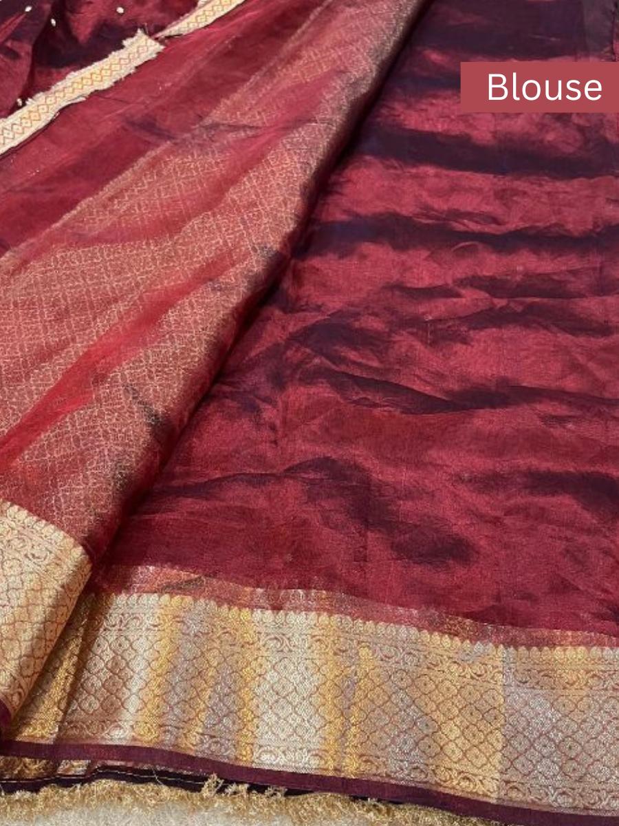 Hand-embroidered maroon tissue silk saree with golden elephant motifs – Banarasi traditional wear