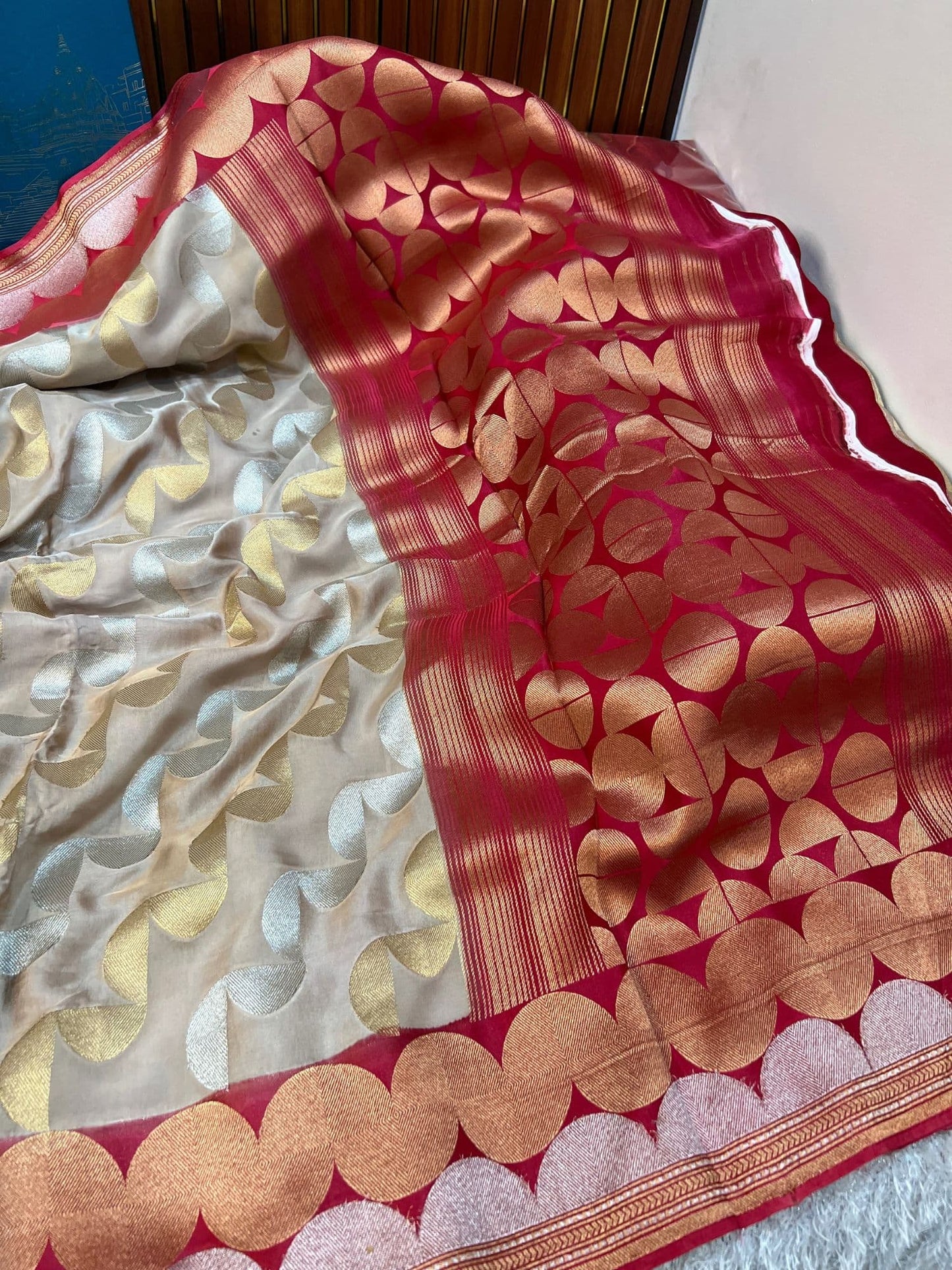 Premium ivory Mashru silk fabric featuring fine weaving and classic Indian craftsmanship