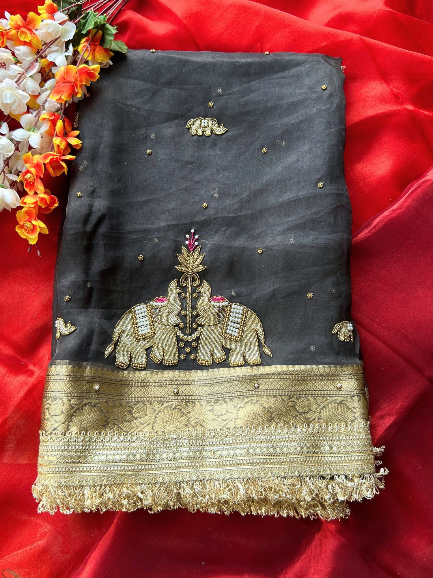 Black Black Tissue Silk Saree Gajraaj  with Hand Embroidered Elephant front view