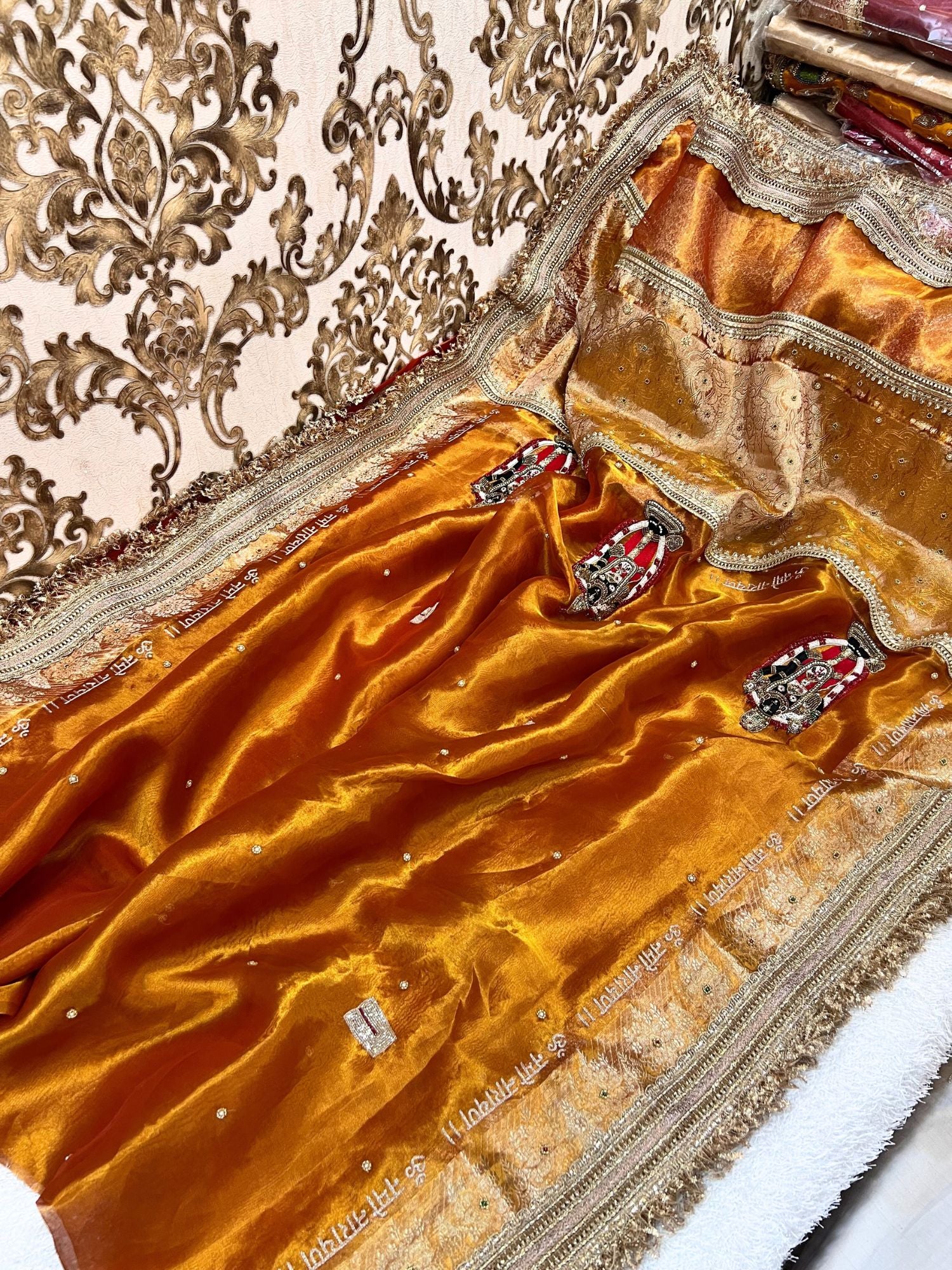 100% Pure Banarasi Tissue Silk Saree with Shri Bala Ji Tirupati Balaji Venkateshwar embroidery in golden-orange shade, traditional Banarasi Tissue Silk saree for festive and wedding wear