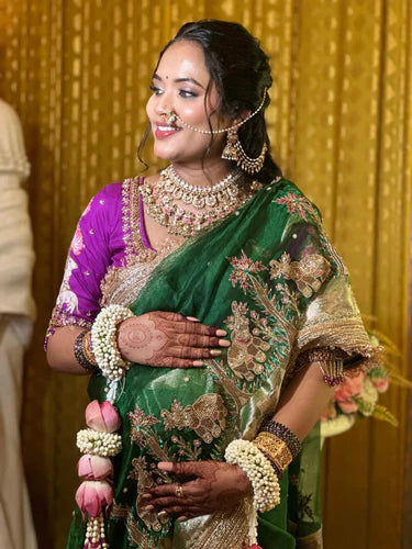 Hand-Embroidered Green Tissue Silk Saree with Twin Elephant Butas