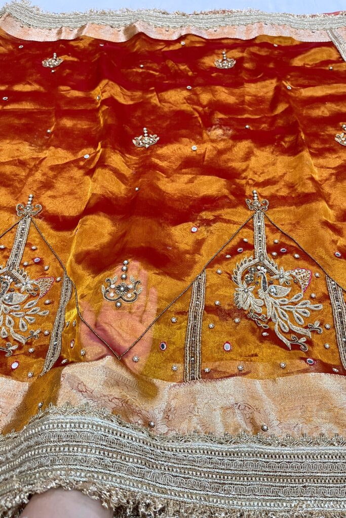 Gold Hand Embroidered Kanjivaram Tissue Silk Saree featuring intricate peacock motifs and unstitched brocade blouse, ideal for weddings and rituals.