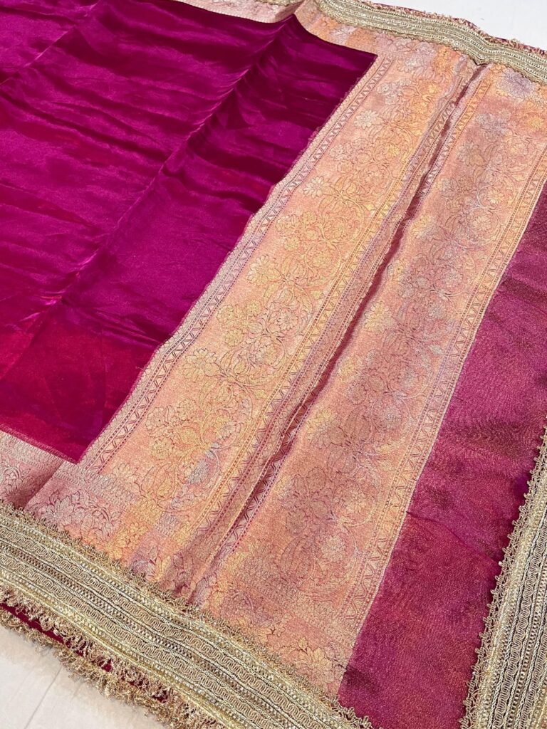 Wine Pure Banarasi Tissue Silk Saree with mirror jaal embroidery, scattered butis, and unstitched brocade blouse – handwoven in Banaras.
