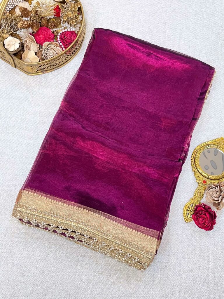 Wine Banarasi Tissue Silk Saree with mirror jaal embroidery, scattered butis, and unstitched brocade blouse – handwoven festive wear from Banaras.