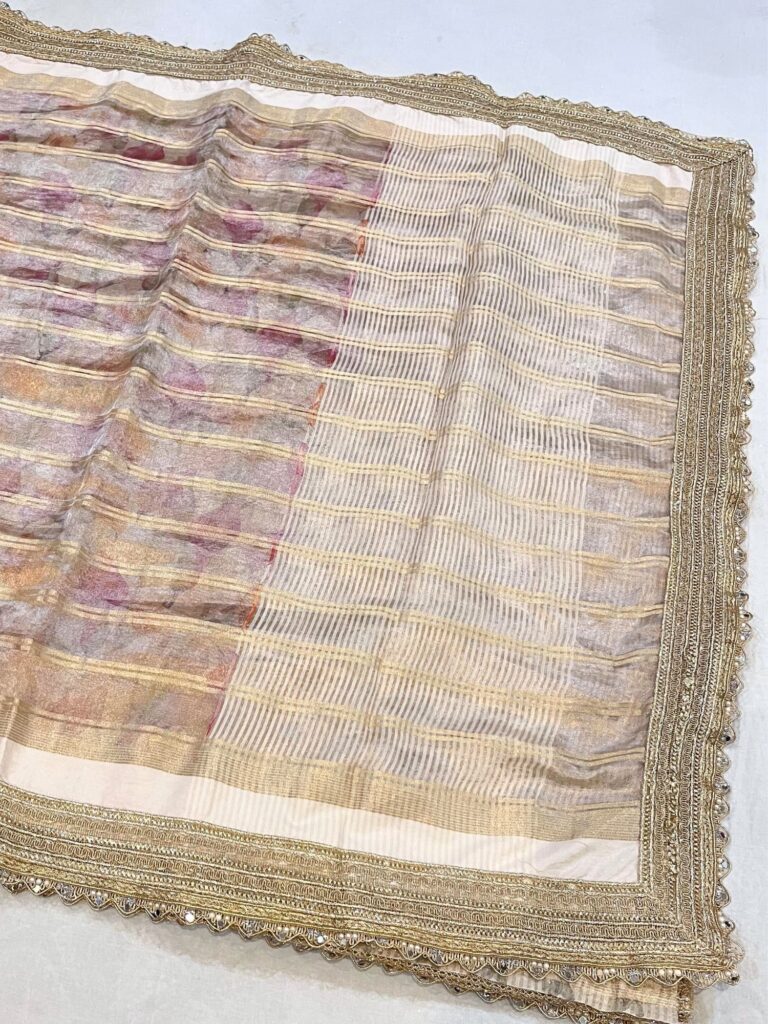 Golden Banarasi Tissue Silk Saree with gota patti border, brocade aachal, and unstitched brocade blouse – handwoven in Banaras.