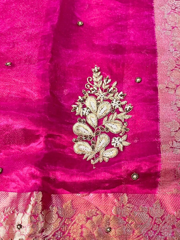 Hand Embroidered Mehndi Green Banarasi Tissue Silk Saree featuring flower buta, gota patti border, brocade aachal, and unstitched brocade blouse.
