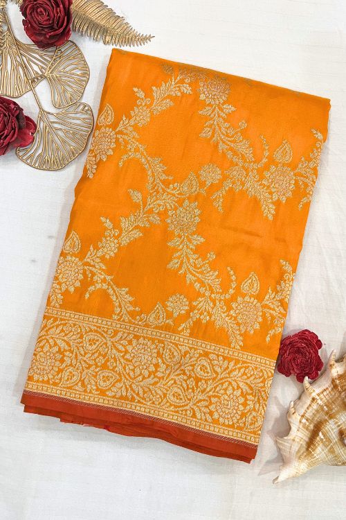 Handwoven Orange Katan Silk Saree with Floral Motifs and Contrast Border
