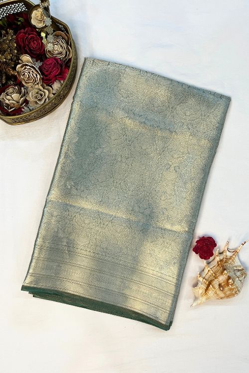 Green Brocade Tissue Silk Saree with delicate silver zari design and unstitched brocade blouse