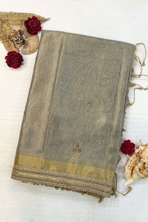 Hand-Embroidered Grey Linen Tissue Silk Saree with intricate detailing, lightweight texture, and elegant shimmer – perfect for festive and formal wear