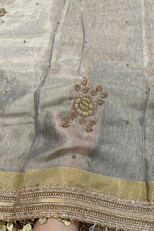 Hand-Embroidered Grey Linen Tissue Silk Saree with intricate detailing, lightweight texture, and elegant shimmer – perfect for festive and formal wear