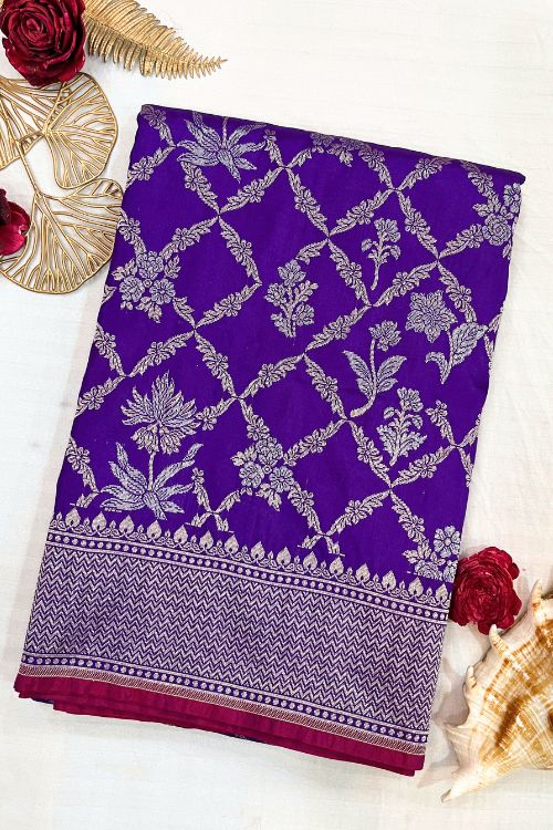 Handwoven Indigo Katan Silk Saree with silver zari floral design and selvedge contrast border