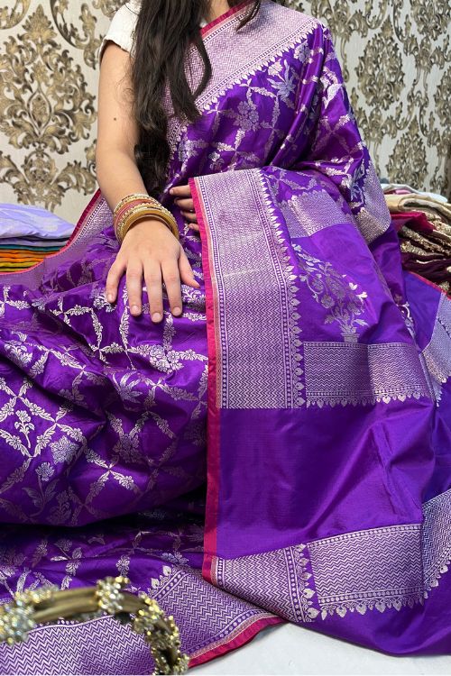 Handwoven Indigo Katan Silk Saree with silver zari floral design and selvedge contrast border