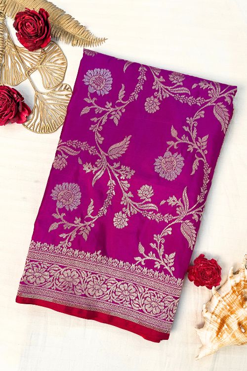 Handwoven Katan Silk Saree with intricate floral zari work and contrast selvedge border, crafted in Banaras