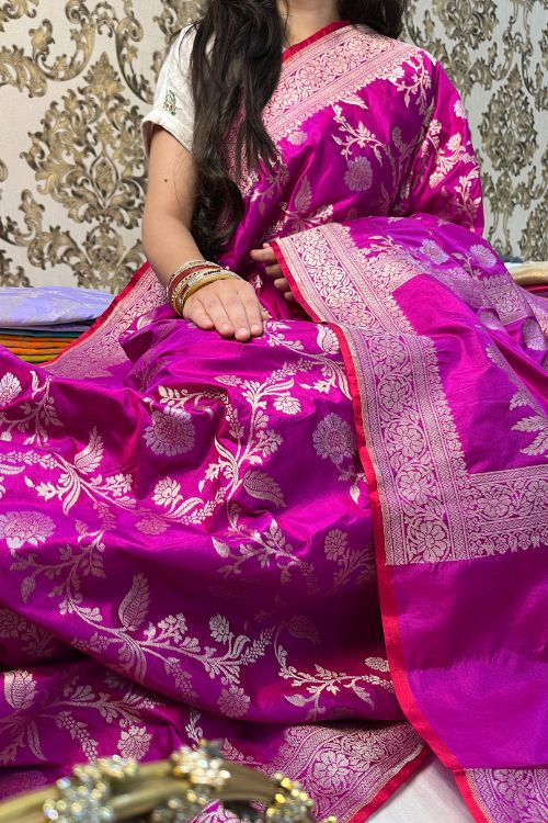 Handwoven Katan Silk Saree with intricate floral zari work and contrast selvedge border, crafted in Banaras