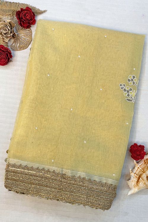 Hand-Embroidered Light Yellow Linen Tissue Silk Saree with Floral Motifs and Zari Lace Border