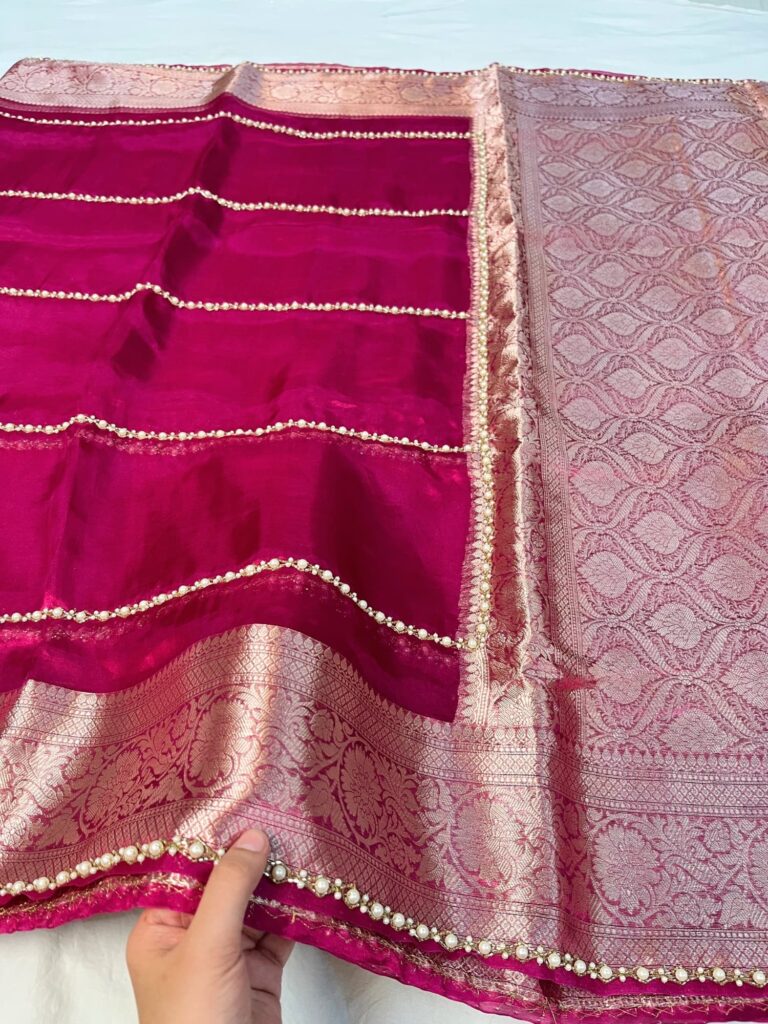 Hand Embroidered Hot Pink Tissue Silk Saree with Pearl Stripe and Buti Motifs, Paired with Brocade Blouse Featuring Neck and Sleeve Embroidery – Elegant Traditional Wear