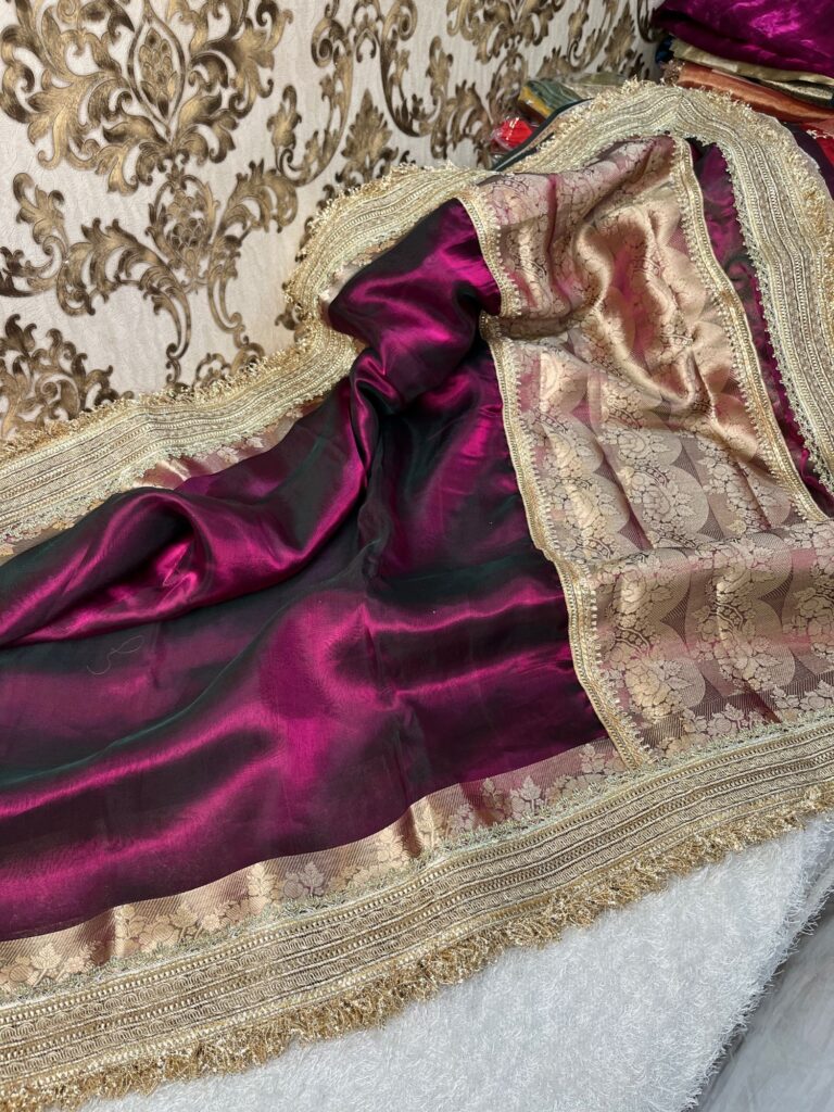 Wine Banarasi tissue silk saree with scattered butis, gota patti border, brocade aachal, and unstitched brocade blouse.