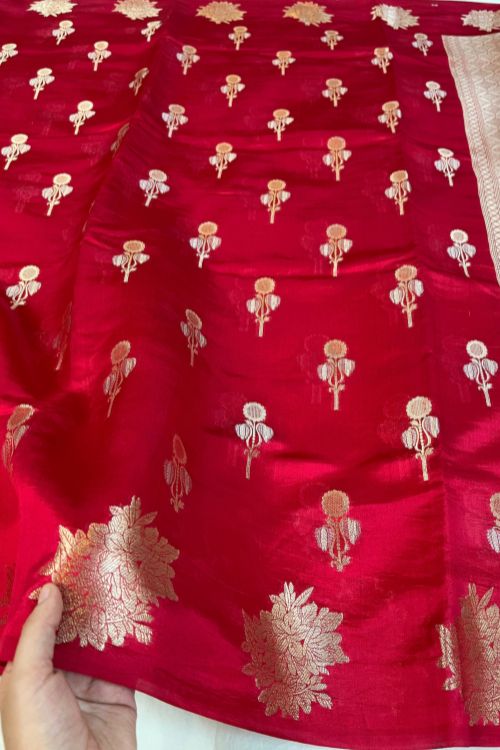 Cherry Red Raw Mango Silk Saree with floral buti, brocade aachal, floral border, and unstitched brocade blouse