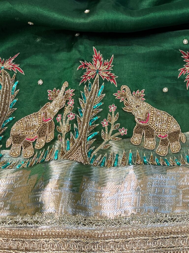 Hand-Embroidered Green Tissue Silk Saree with Twin Elephant Butas
