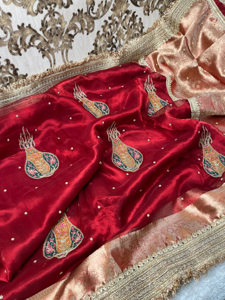 Red Banarasi Tissue Silk Saree with Matka Hand Embroidered Buta, Gota Patti Border, and Unstitched Brocade Blouse