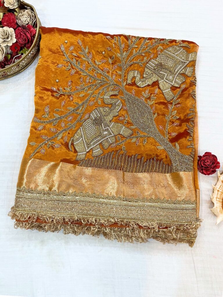 Elegant Kanjivaram Gold Tissue Silk Saree with traditional Elephant corner design