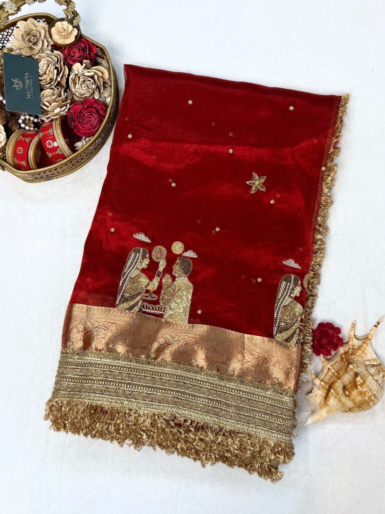 Royal red Banarasi tissue silk saree with Karwa Chauth motifs and golden zari border